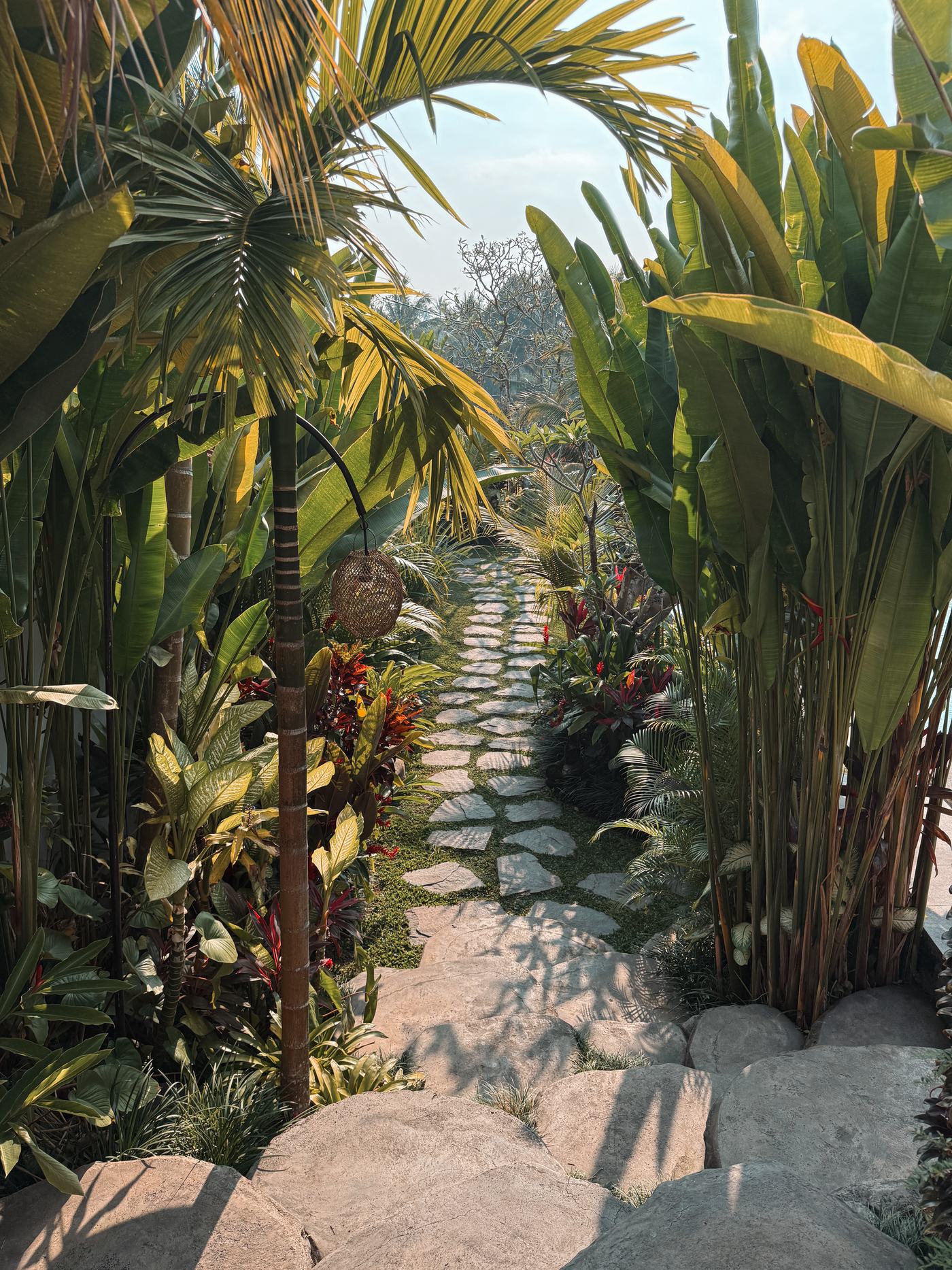 Ubud · Stone path through the hotel garden · Bali